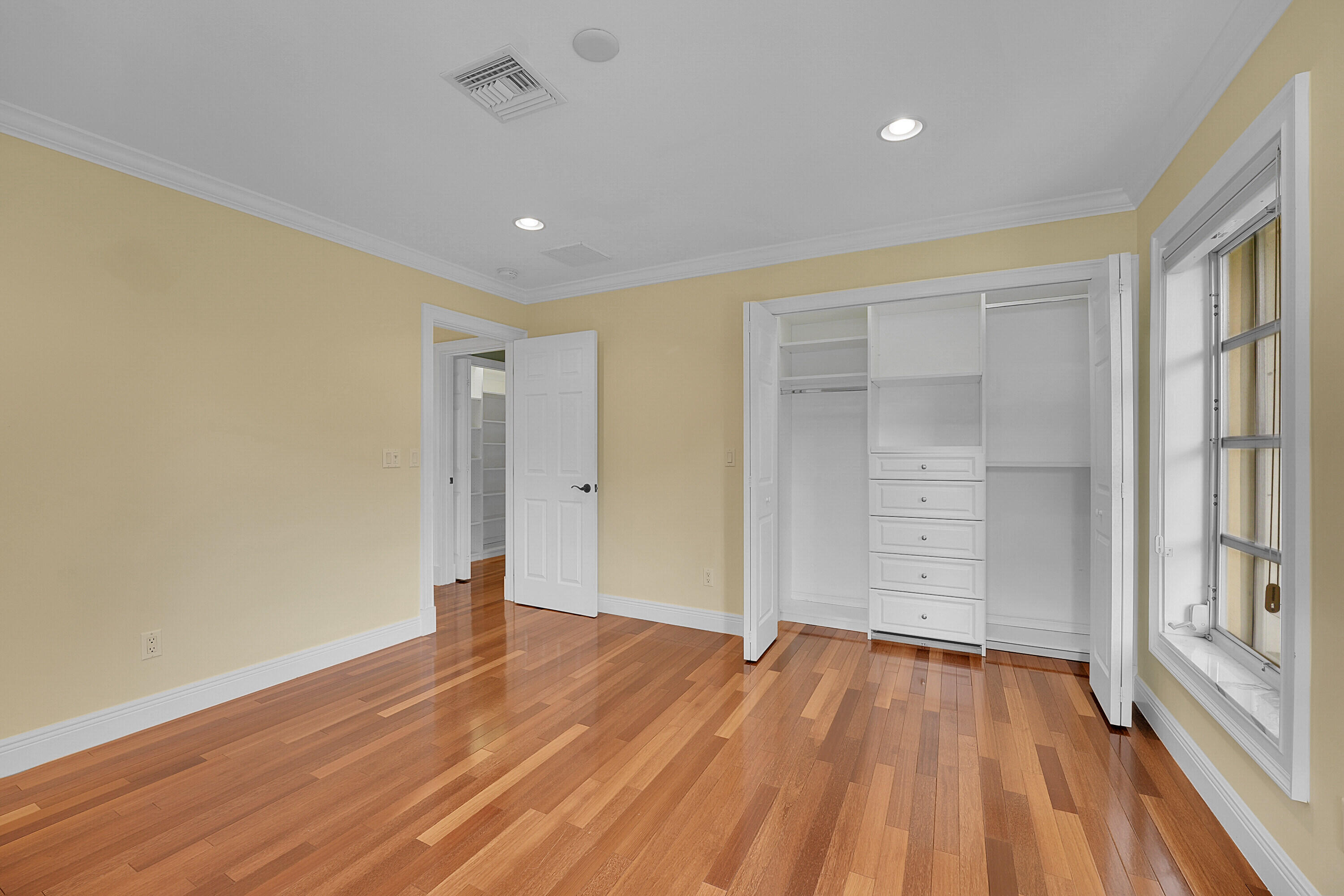 10 Middle Road Sewall's Point, FL 34996 - Photo 21 of 28 wooden floor in an empty room with a window