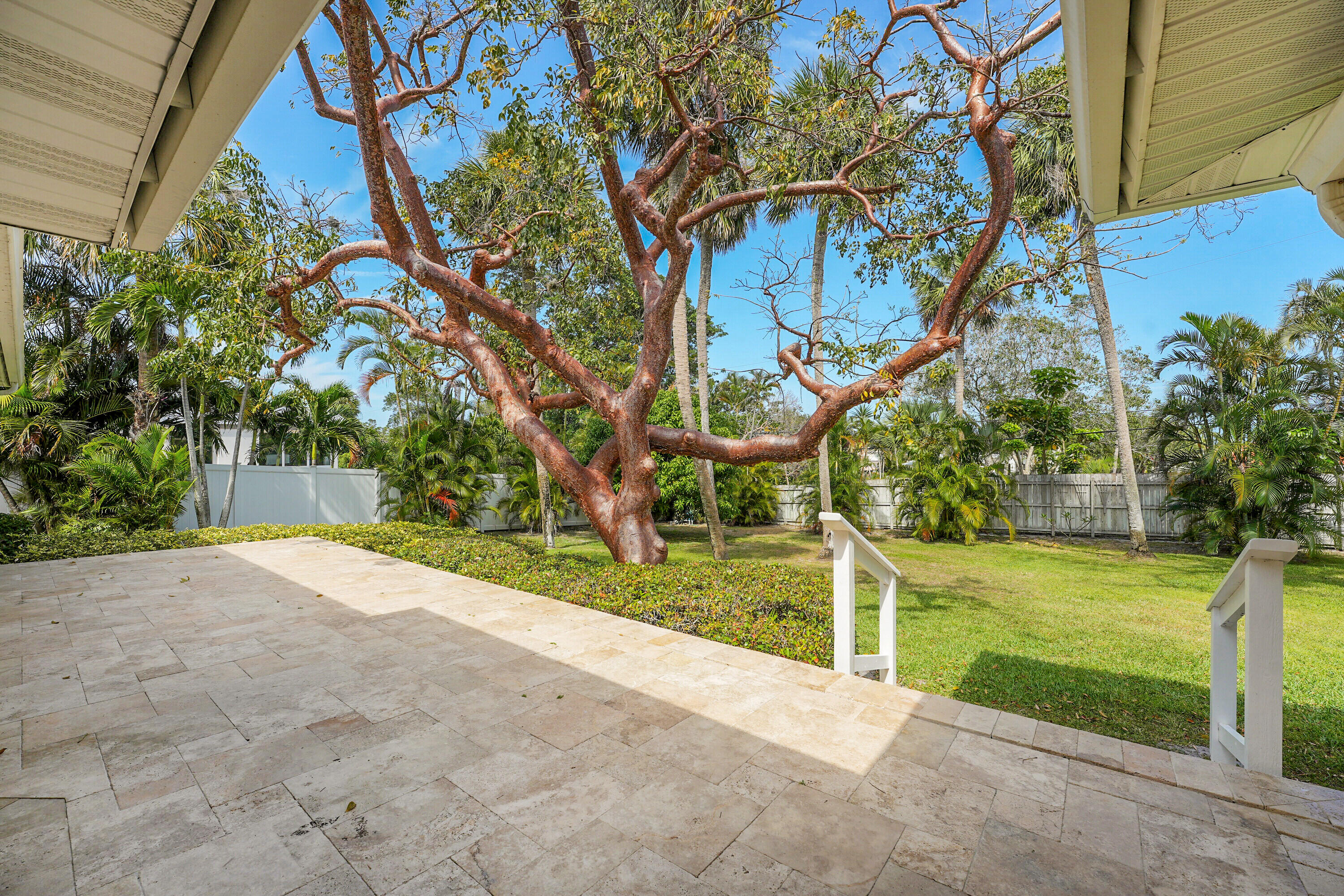 10 Middle Road Sewall's Point, FL 34996 - Photo 22 of 28 a view of a house with a yard and tree s