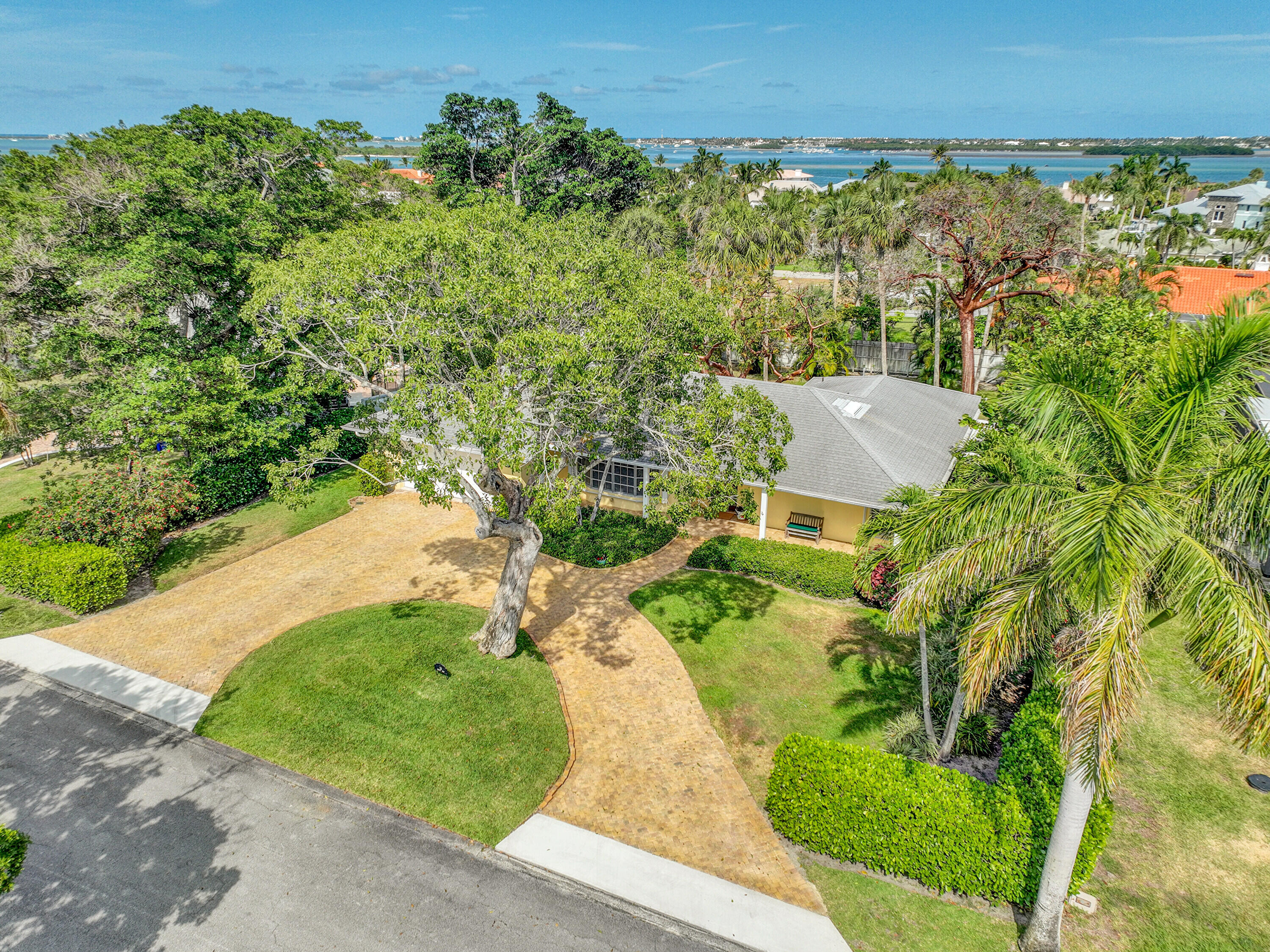 10 Middle Road Sewall's Point, FL 34996 - Photo 26 of 28 an aerial view of a house with a yard