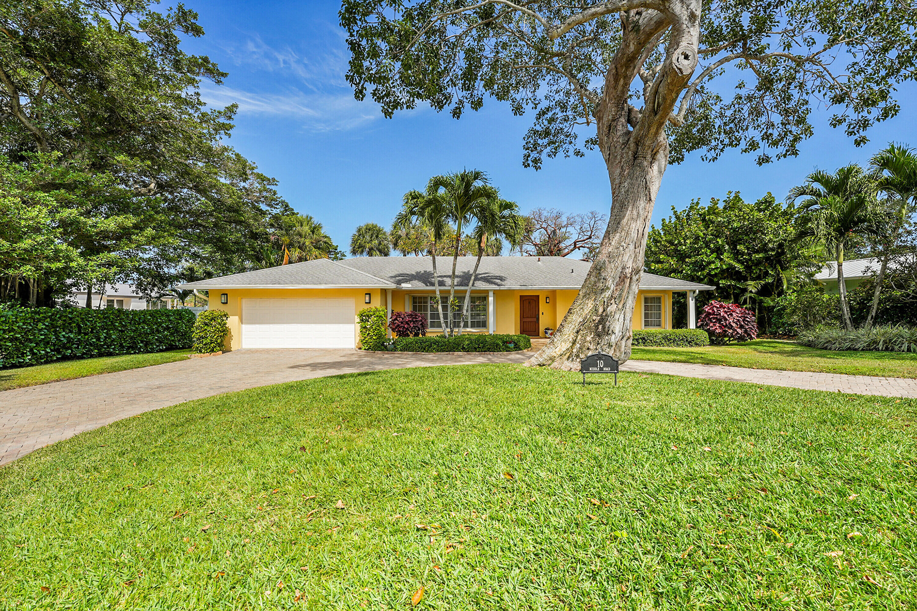 10 Middle Road Sewall's Point, FL 34996 - Photo 27 of 28 a front view of a house with garden