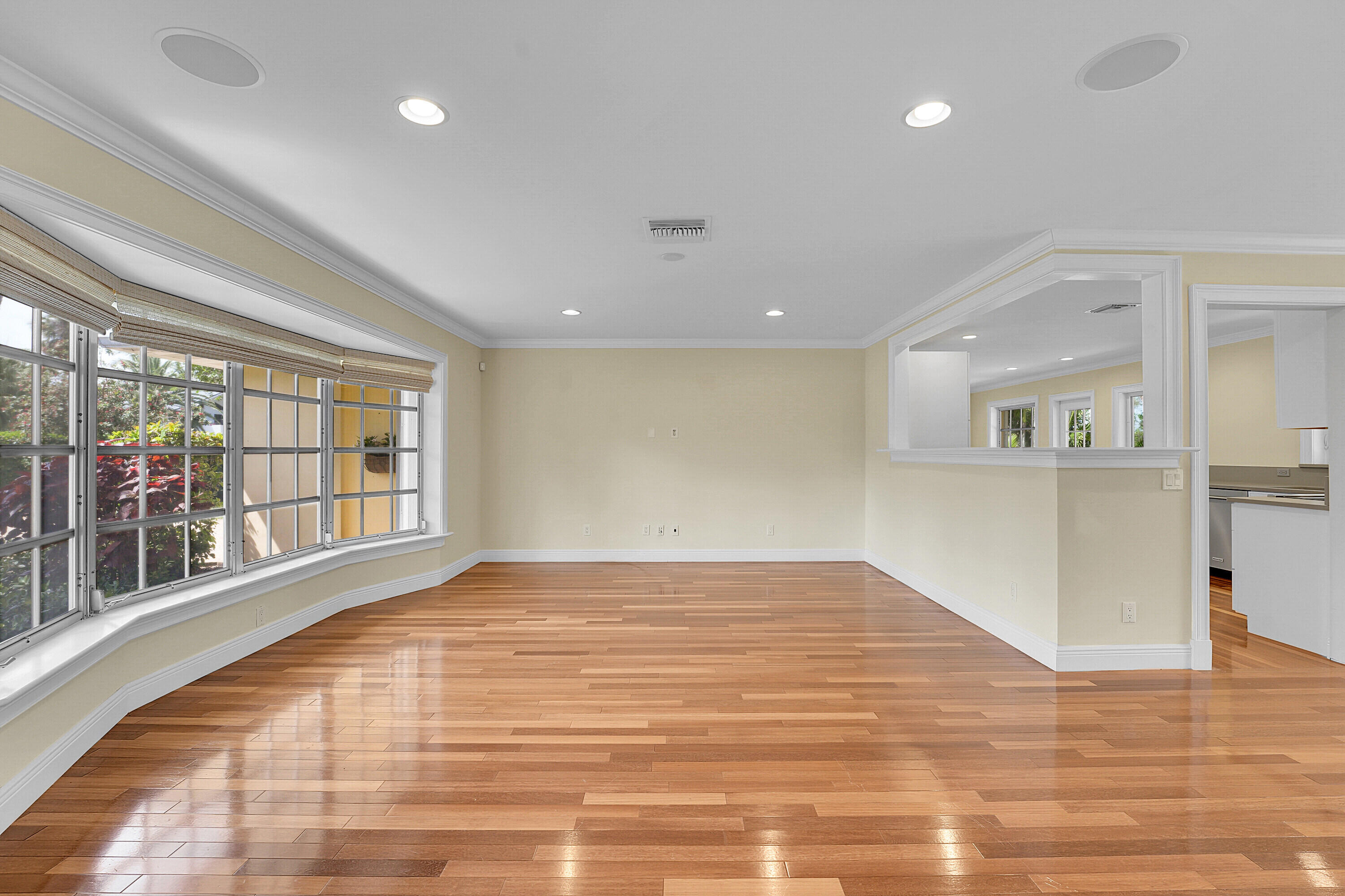 10 Middle Road Sewall's Point, FL 34996 - Photo 7 of 28 a view of an empty room with wooden floor and a window