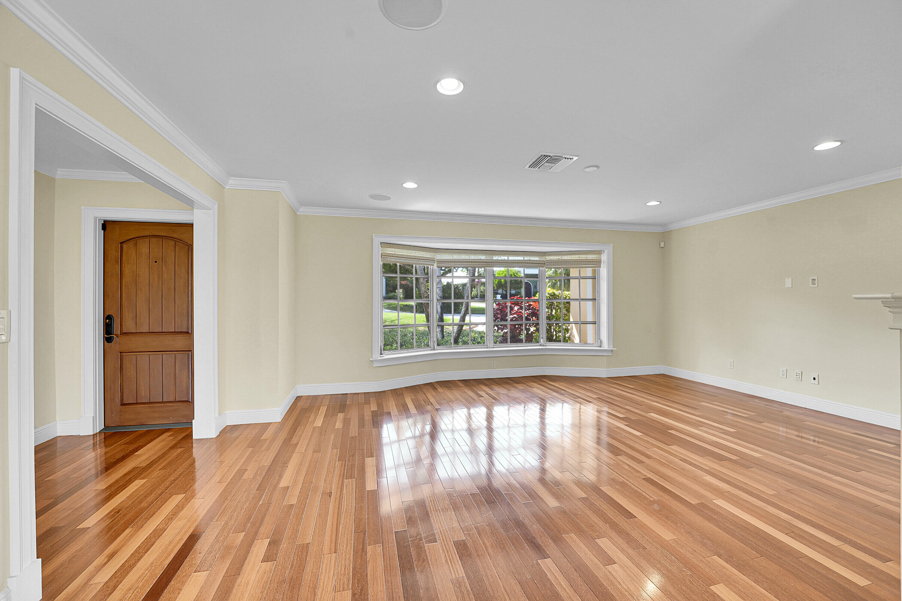 10 Middle Road Sewall's Point, FL 34996 - Photo 10 of 28 a view of an empty room window and wooden floor
