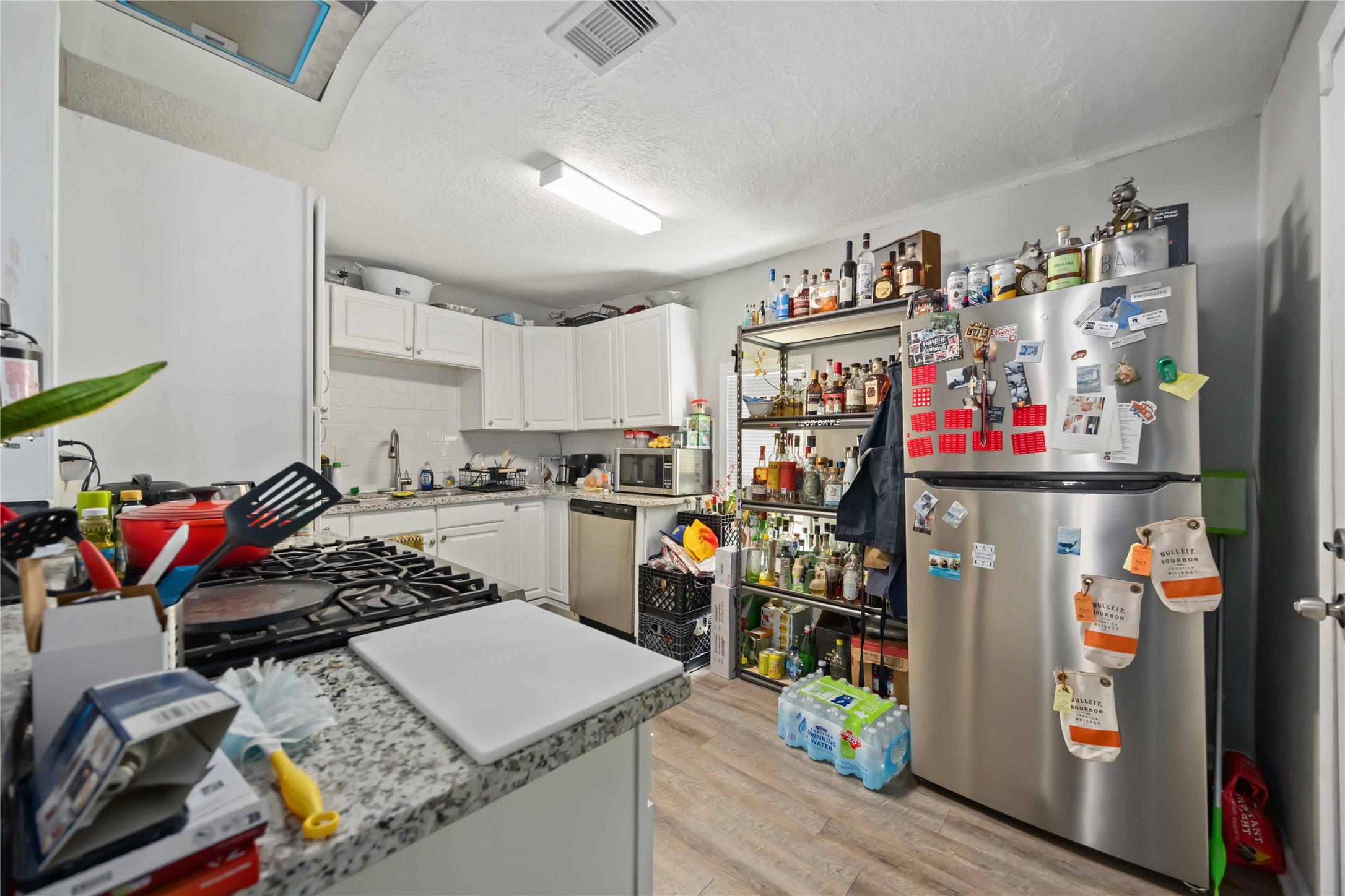 3710 Bremond Street Houston, TX 77004 - Photo 11 of 30 a view of a kitchen with appliances and cabinets