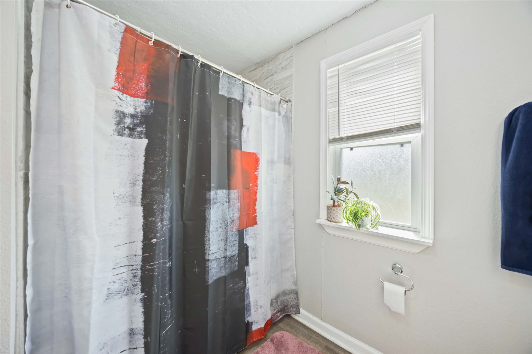 3710 Bremond Street Houston, TX 77004 - Photo 18 of 30 a bathroom with a bathtub and a shower