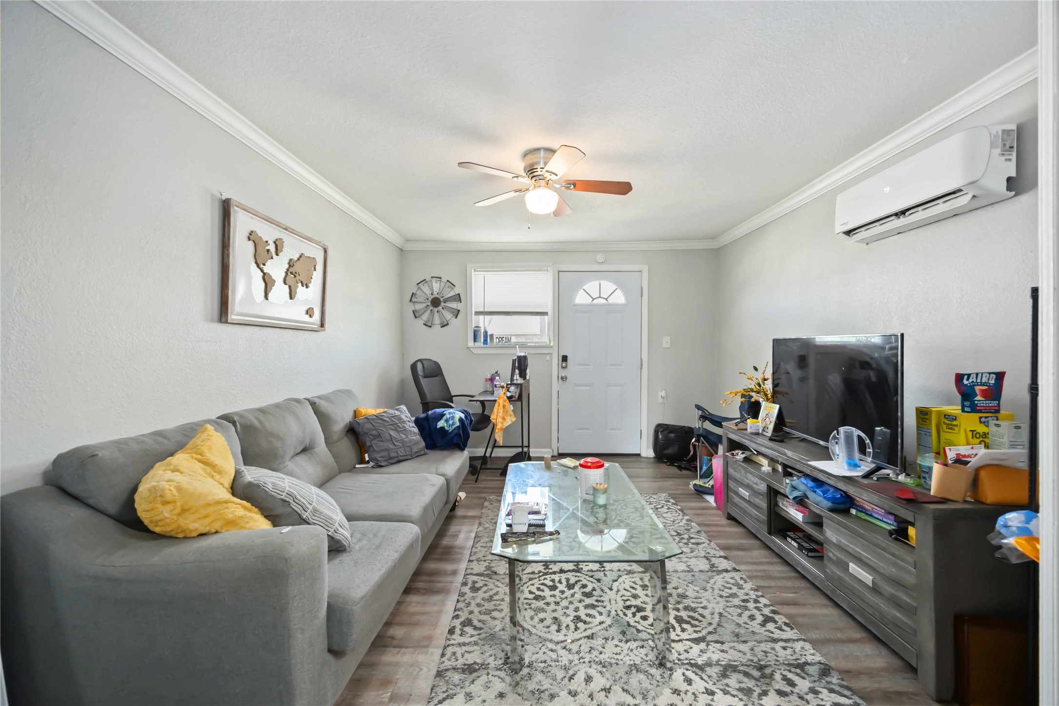 3710 Bremond Street Houston, TX 77004 - Photo 19 of 30 a living room with furniture and a flat screen tv