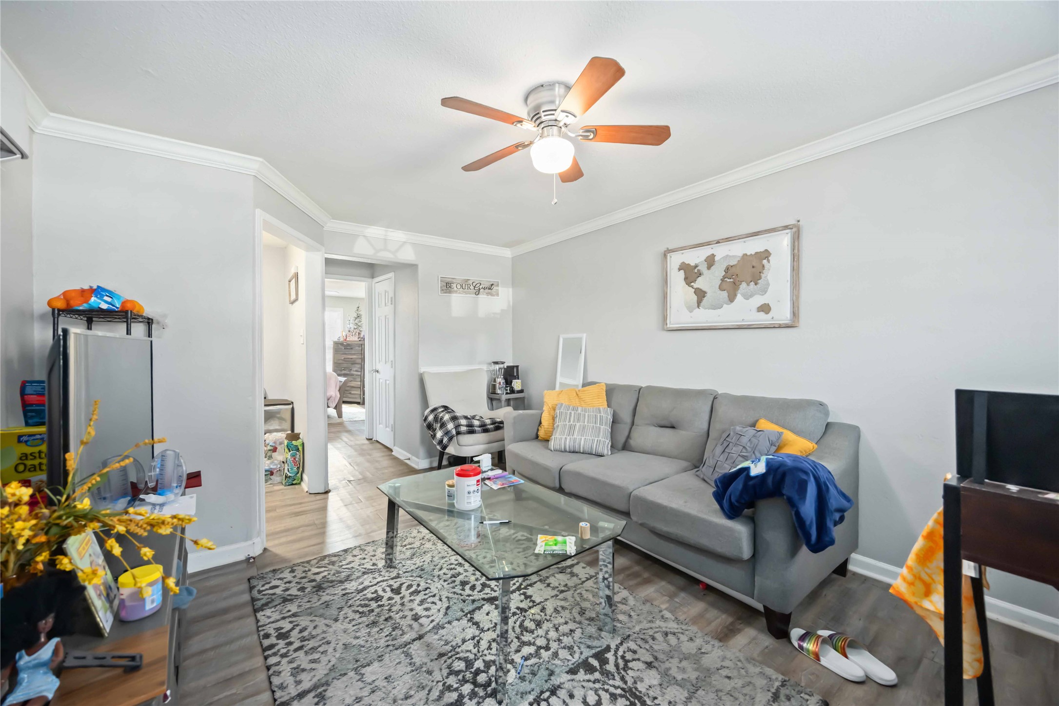 3710 Bremond Street Houston, TX 77004 - Photo 20 of 30 a living room with furniture and wooden floor