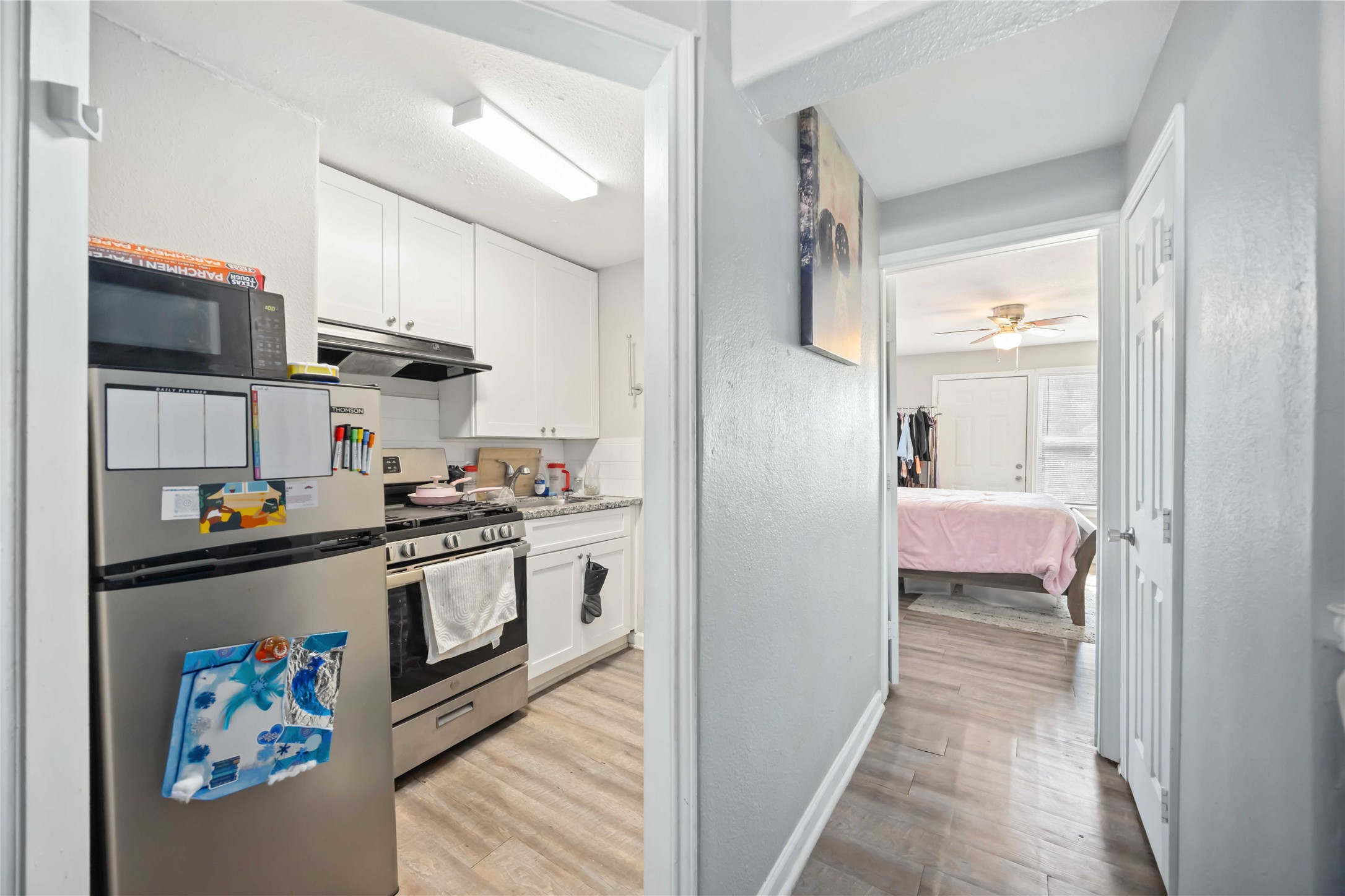3710 Bremond Street Houston, TX 77004 - Photo 22 of 30 a kitchen with stainless steel appliances a sink and a stove