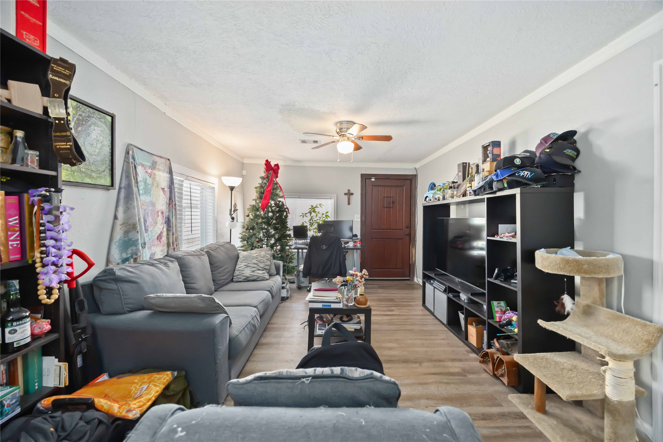 3710 Bremond Street Houston, TX 77004 - Photo 5 of 30 a living room with furniture and a flat screen tv