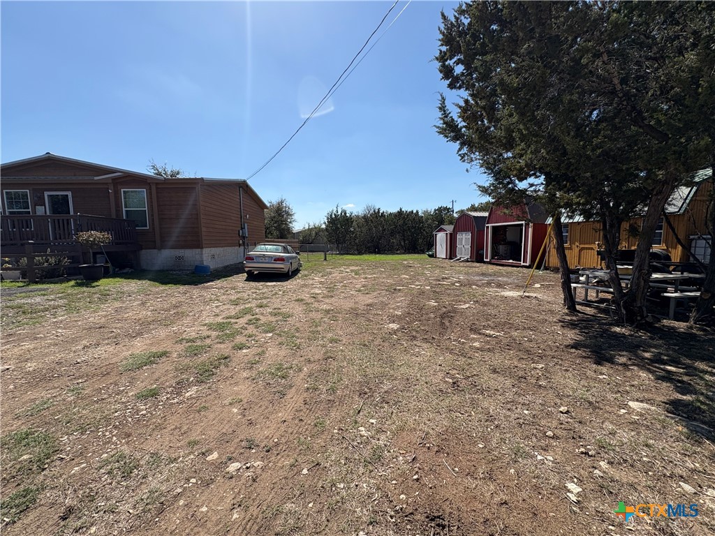 371 Moosehead Road Spring Branch, TX 78070 - Photo 4 of 17 a view of a house with a yard