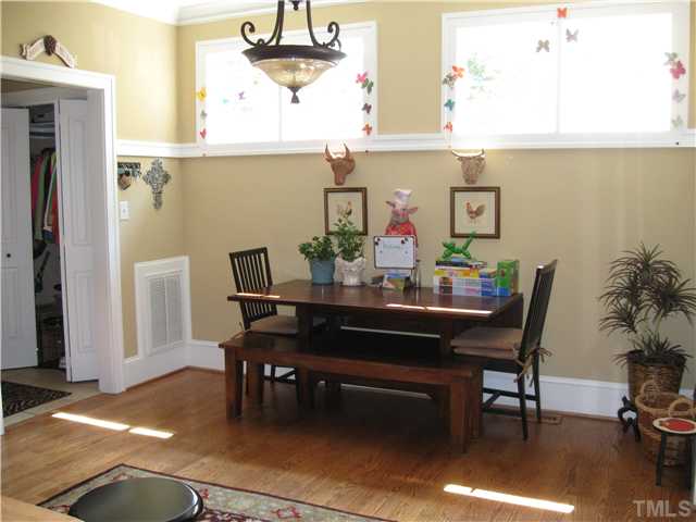 706 Tower Street Raleigh, NC 27607 - Photo 7 of 23 a view of a dining room with furniture