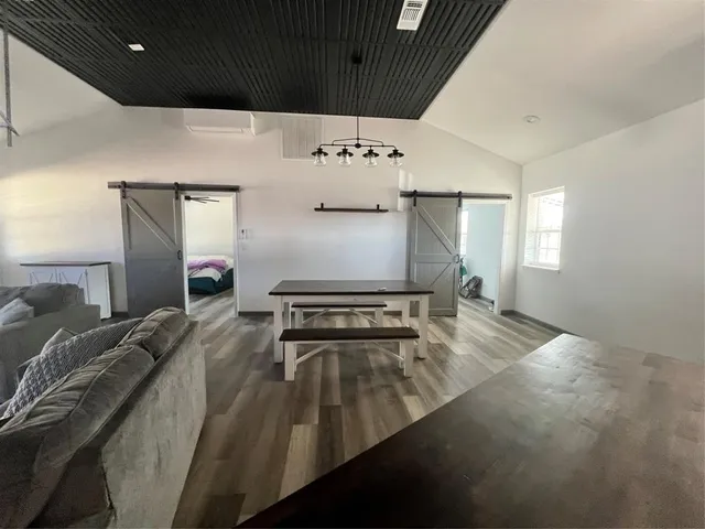 a bedroom with bed and window