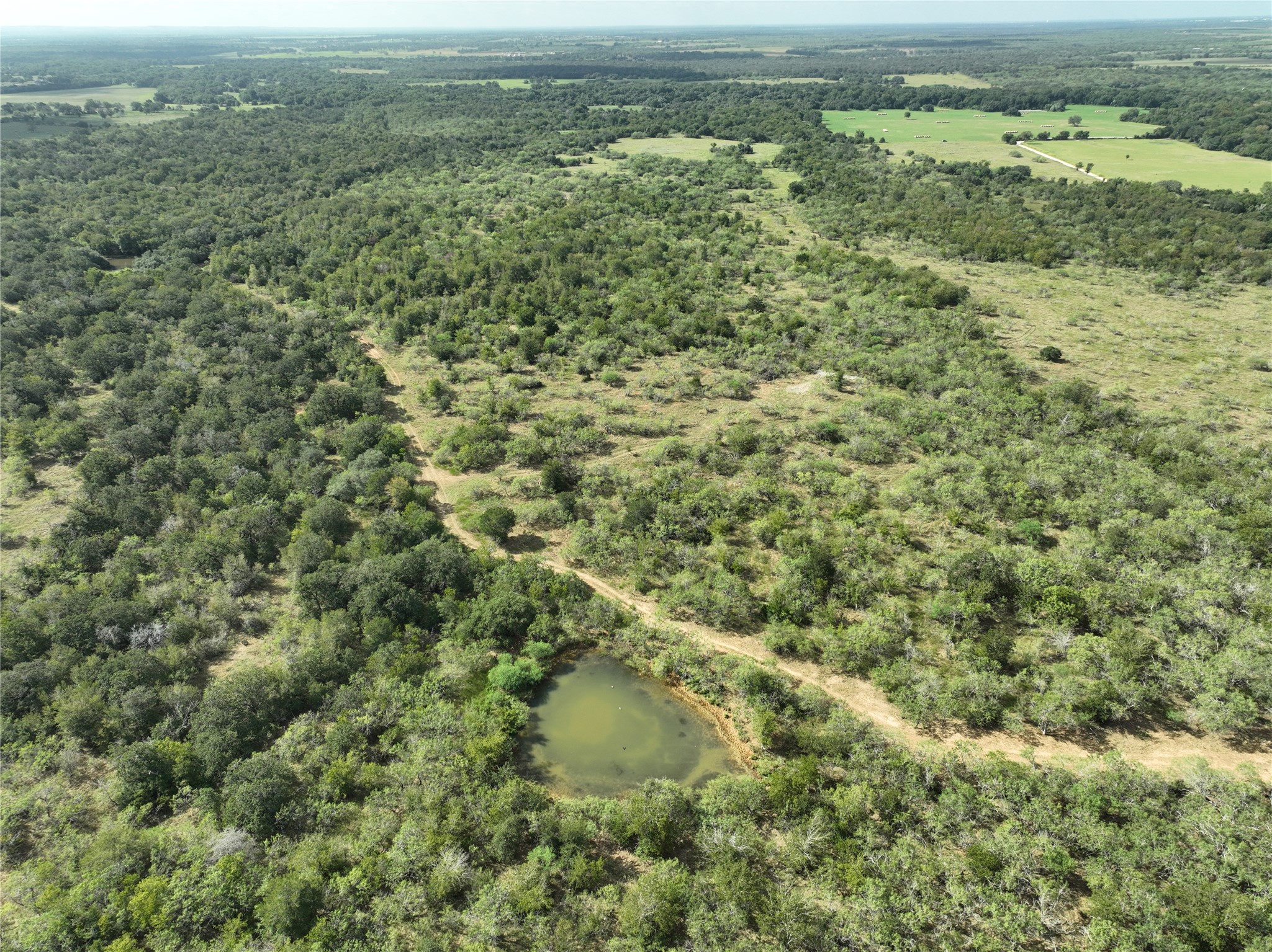 424 Rd Waelder Tx 78629 Road Waelder, TX 78959 - Photo 8 of 25 Aerial view of property's location featuring rural landscape