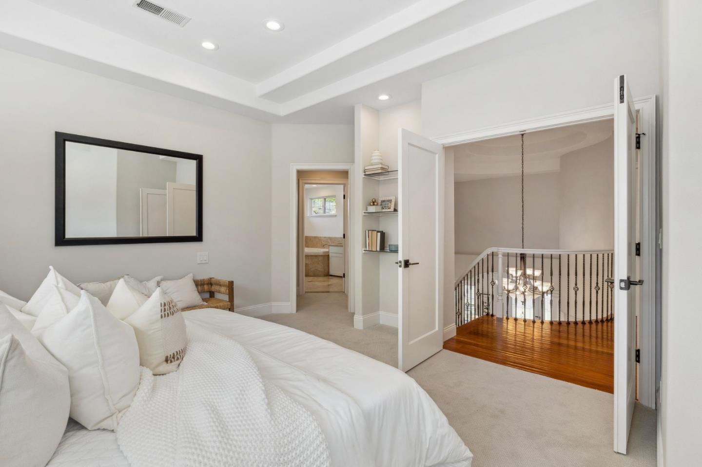 14574 Nelson Way San Jose, CA 95124 - Photo 35 of 62 a bedroom with bed and walk in closet