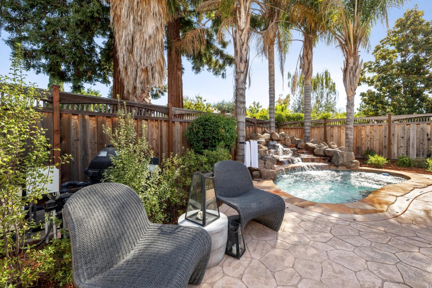 14574 Nelson Way San Jose, CA 95124 - Photo 55 of 62 a view of a backyard with plants and a patio