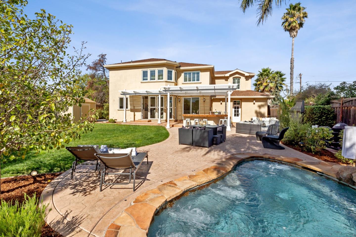 14574 Nelson Way San Jose, CA 95124 - Photo 56 of 62 a view of a house with backyard sitting area and swimming pool