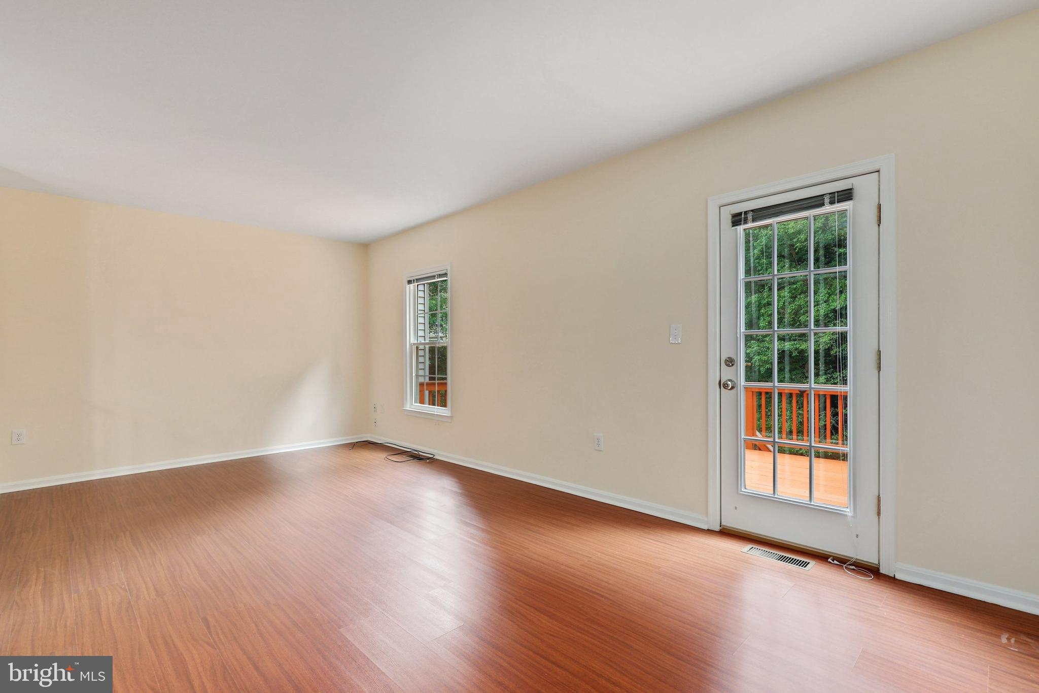 7404 Spring Tree Drive Springfield, VA 22153 - Photo 12 of 31 Living room with French door to deck.