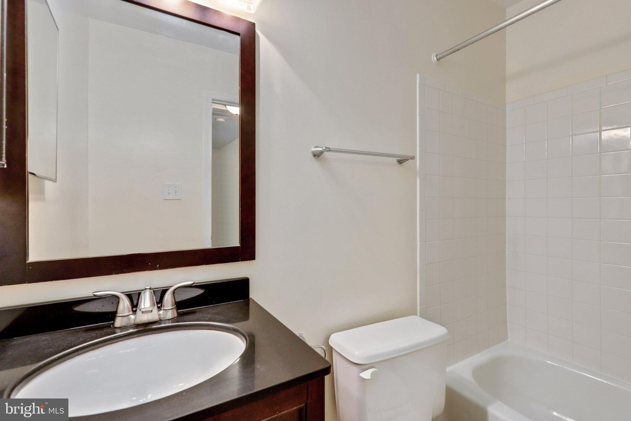 7404 Spring Tree Drive Springfield, VA 22153 - Photo 20 of 31 Full hall bath on bedroom level.