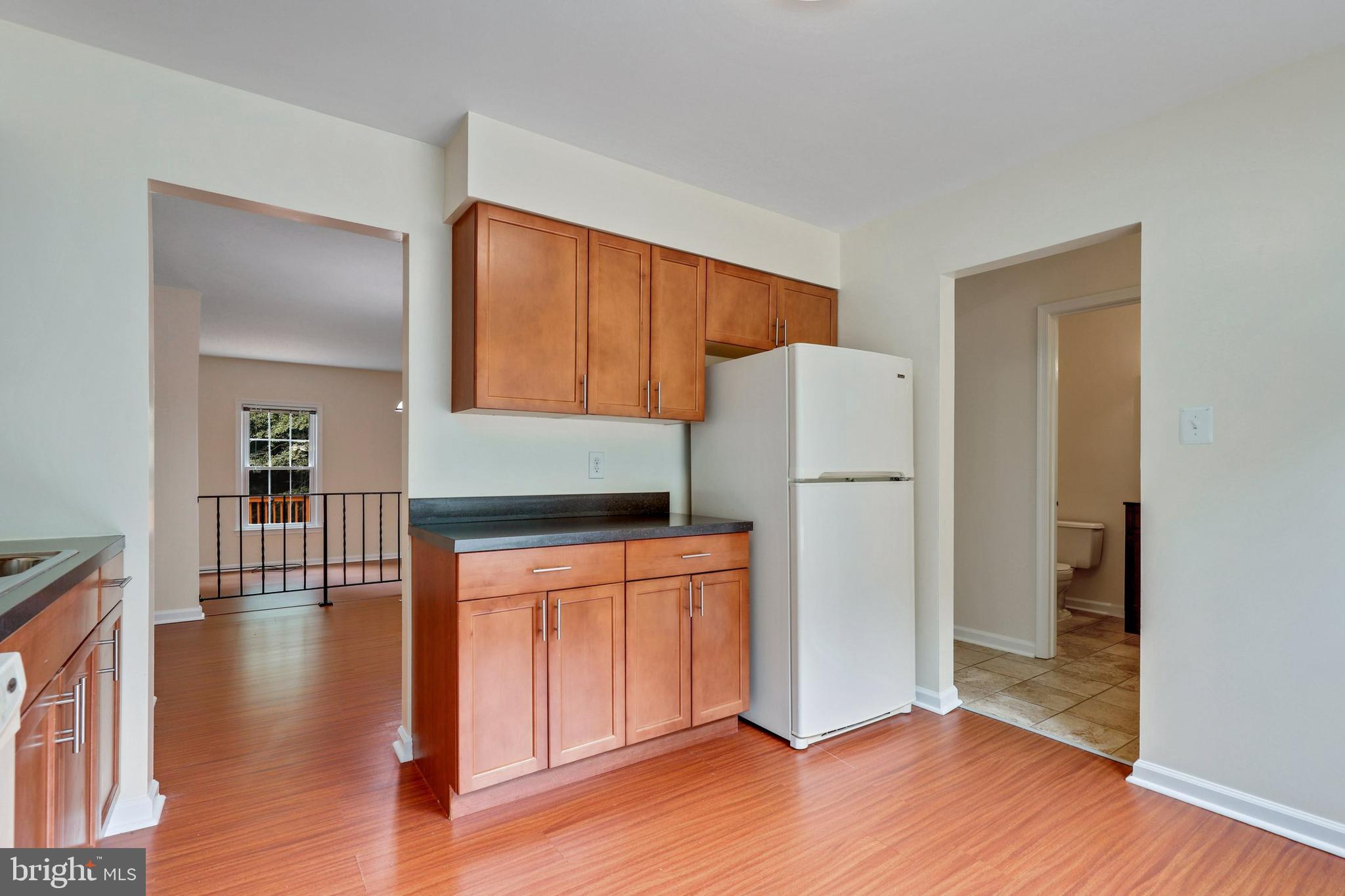 7404 Spring Tree Drive Springfield, VA 22153 - Photo 6 of 31 Kitchen with entry to dining area.