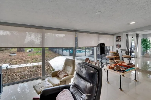 a kitchen with stainless steel appliances granite countertop a sink a stove and cabinets
