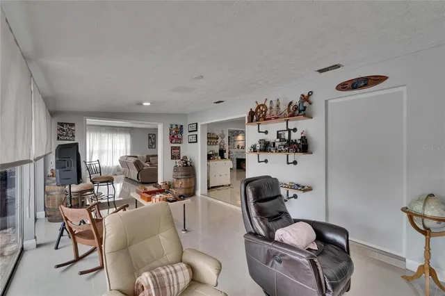 a kitchen with appliances a sink and cabinets