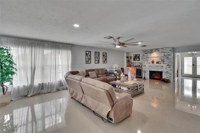 a kitchen with a refrigerator stove and microwave