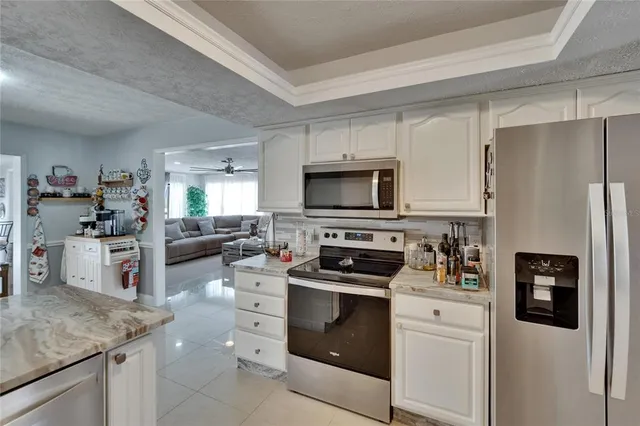 a bathroom with a granite countertop sink mirror and double