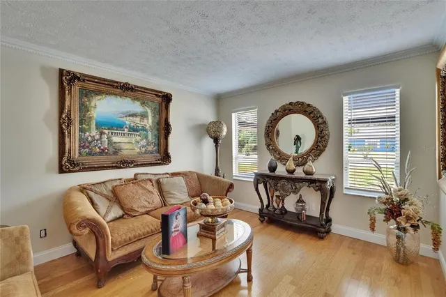 a living room with furniture and a view of living room