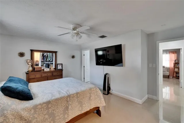 a view of swimming pool with a patio