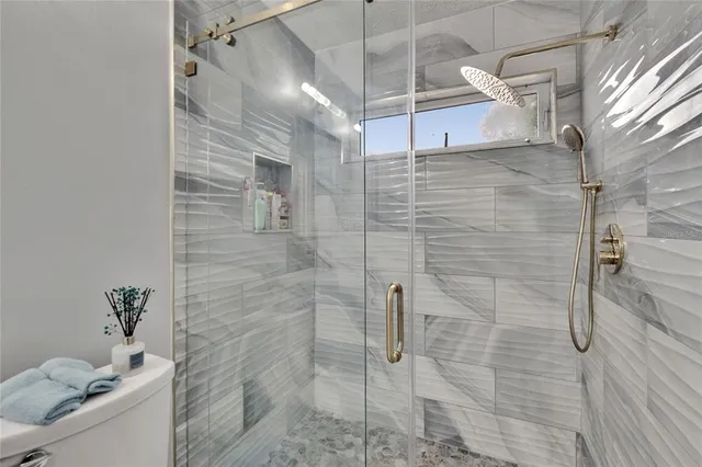 a view of a chairs and table in the patio