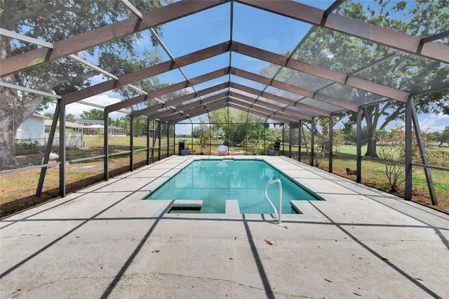 a bathroom with a sink a toilet and a window