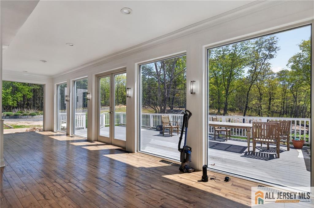 381 Monmouth Road Freehold, NJ 07728 - Photo 15 of 63 a view of a living room and hardwood floor