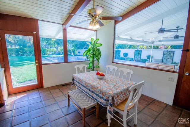 a spacious bedroom with a bed and a table