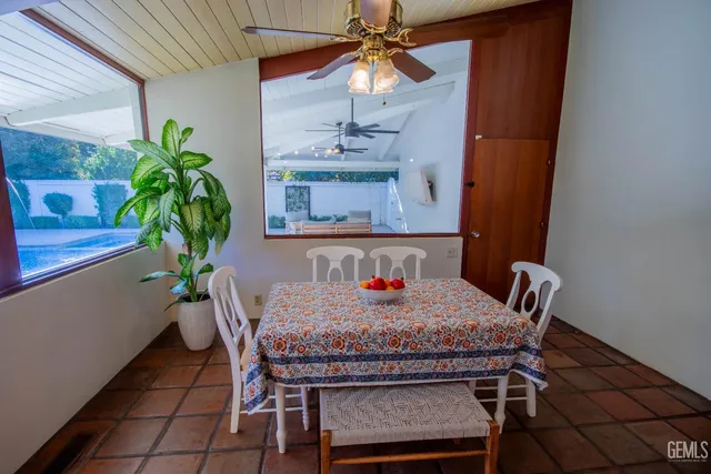 a bathroom with a sink a vanity and a mirror