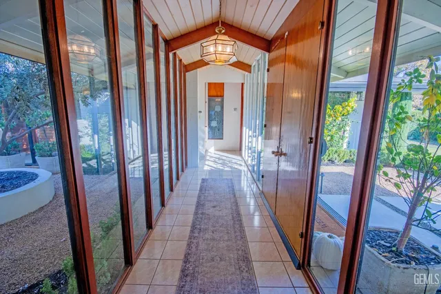 a outdoor space with lots of furniture and a potted plant