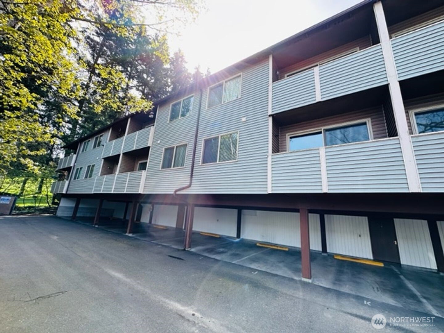 5631 Hwy Place, Unit 8 Everett, WA 98203 - Photo 11 of 11 a large white building with a table and chairs