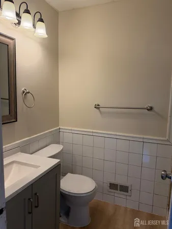 a bathroom with a sink and toilet