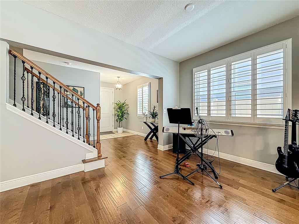 10193 Grand Oak Circle Madeira Beach, FL 33708 - Photo 9 of 67 a view of a workspace with wooden floor