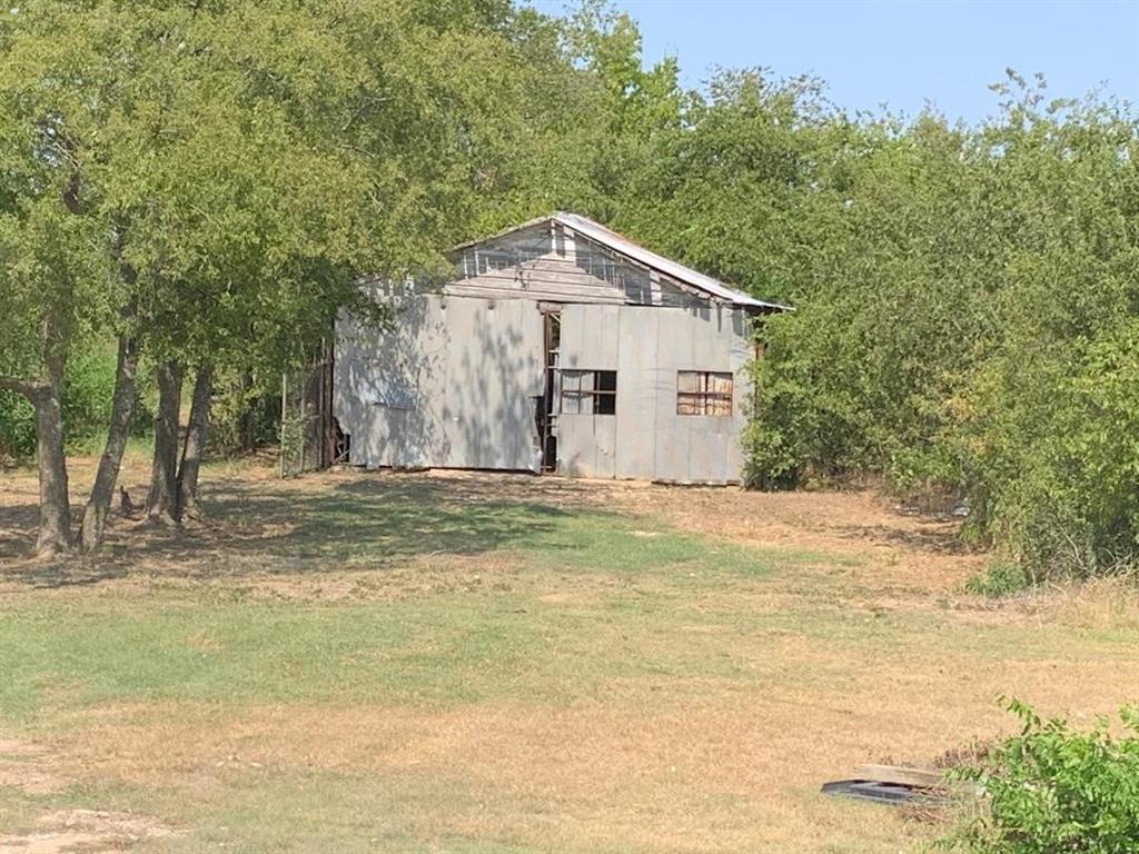 1203 St Highway Whitney, TX 76692 - Photo 3 of 6 a view of a house with a yard and tree s