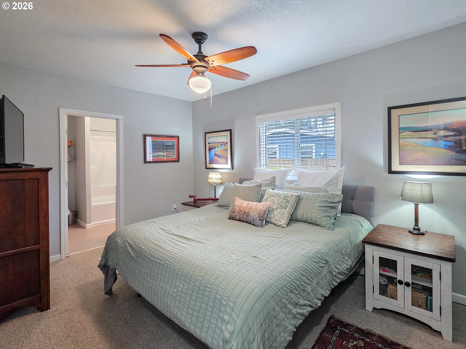 1214 North Clark Street Cornelius, OR 97113 - Photo 19 of 34 a bedroom with a large bed and a window
