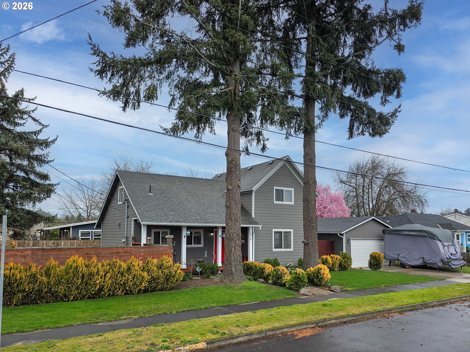 1214 North Clark Street Cornelius, OR 97113 - Photo 2 of 34 front view of a house with a big yard