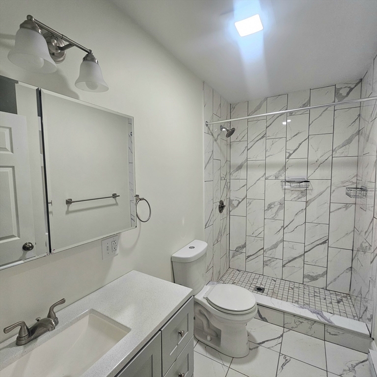 49 Charter Street, Unit 3 Boston, MA 02113 - Photo 10 of 10 a bathroom with a sink toilet and shower
