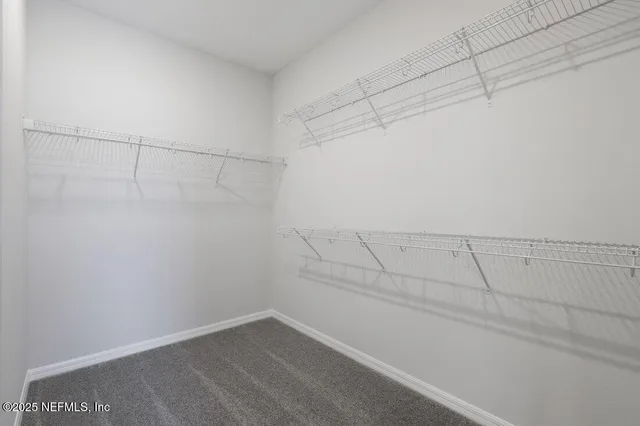 a view of a room with racks on the wall