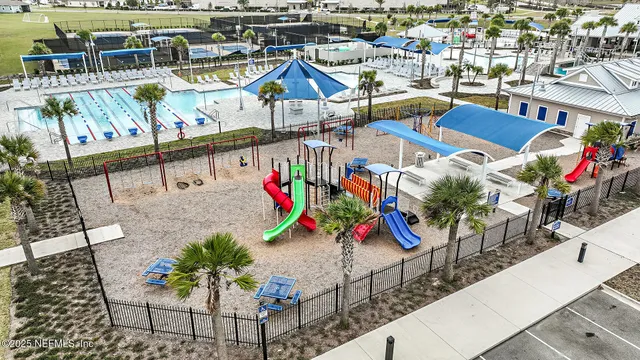 a view of a swimming pool and outdoor space