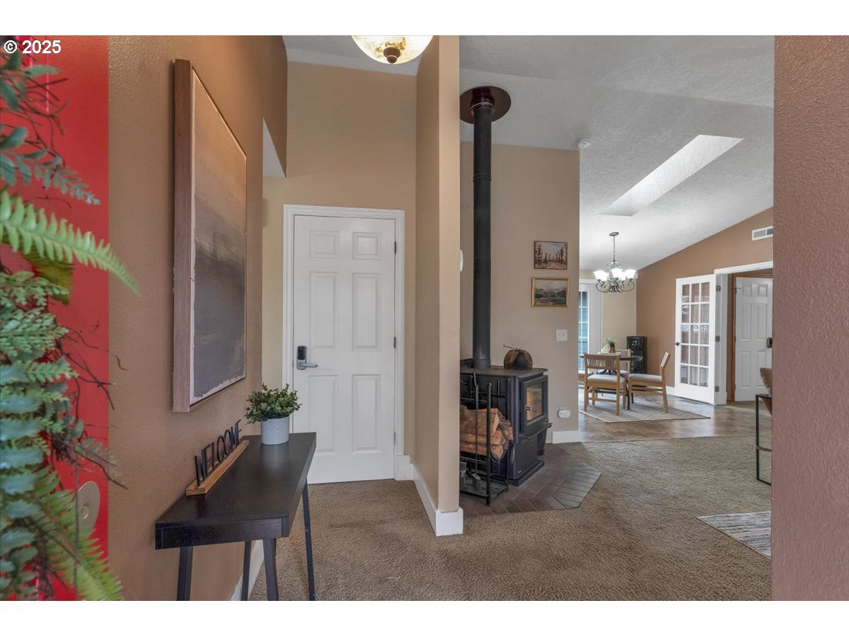 1393 Southwest Alexander Drive Dallas, OR 97338 - Photo 7 of 47 a living room with furniture and large window