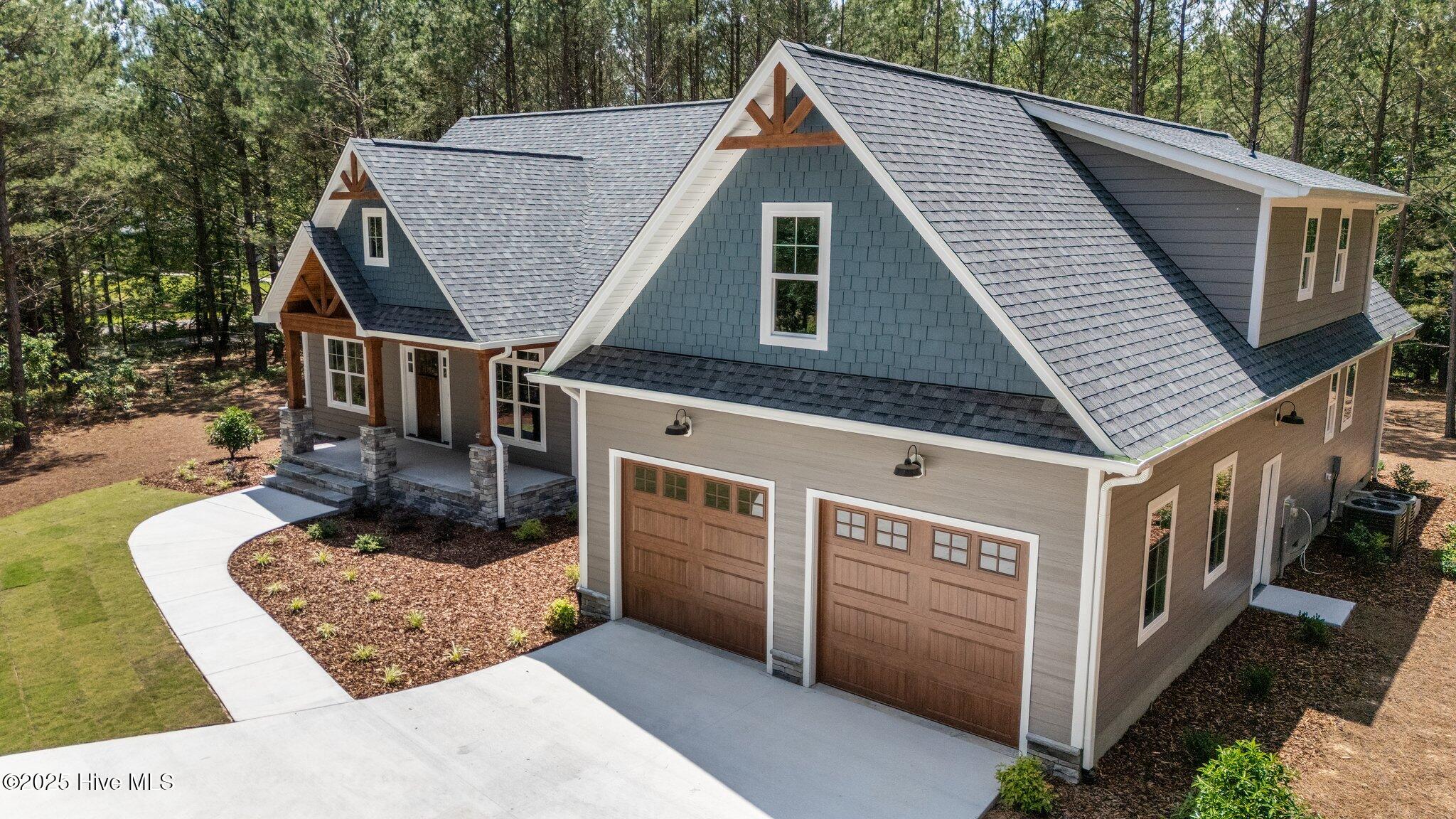 5400 Dowd Road West End, NC 27376 - Photo 4 of 60 53-web-or-mls-DJI_20250521141519_0932_D