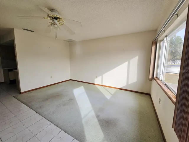 a view of livingroom with kitchen