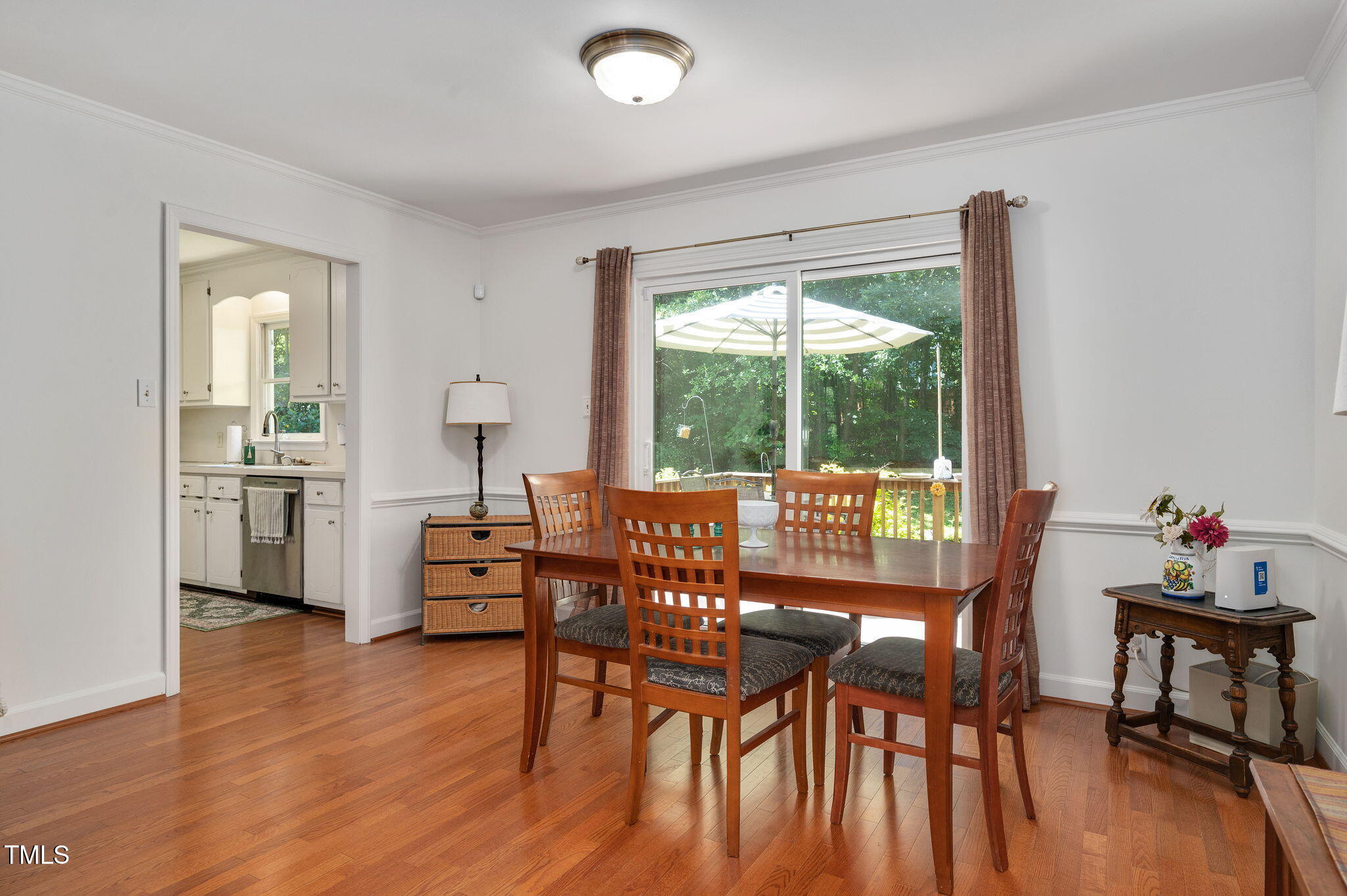 5320 Middleton Road Durham, NC 27713 - Photo 11 of 36 a view of a dining room with furniture and wooden floor