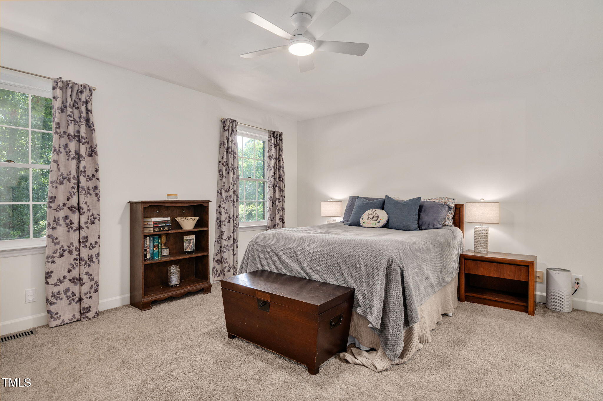 5320 Middleton Road Durham, NC 27713 - Photo 18 of 36 a bedroom with a bed and a cabinets