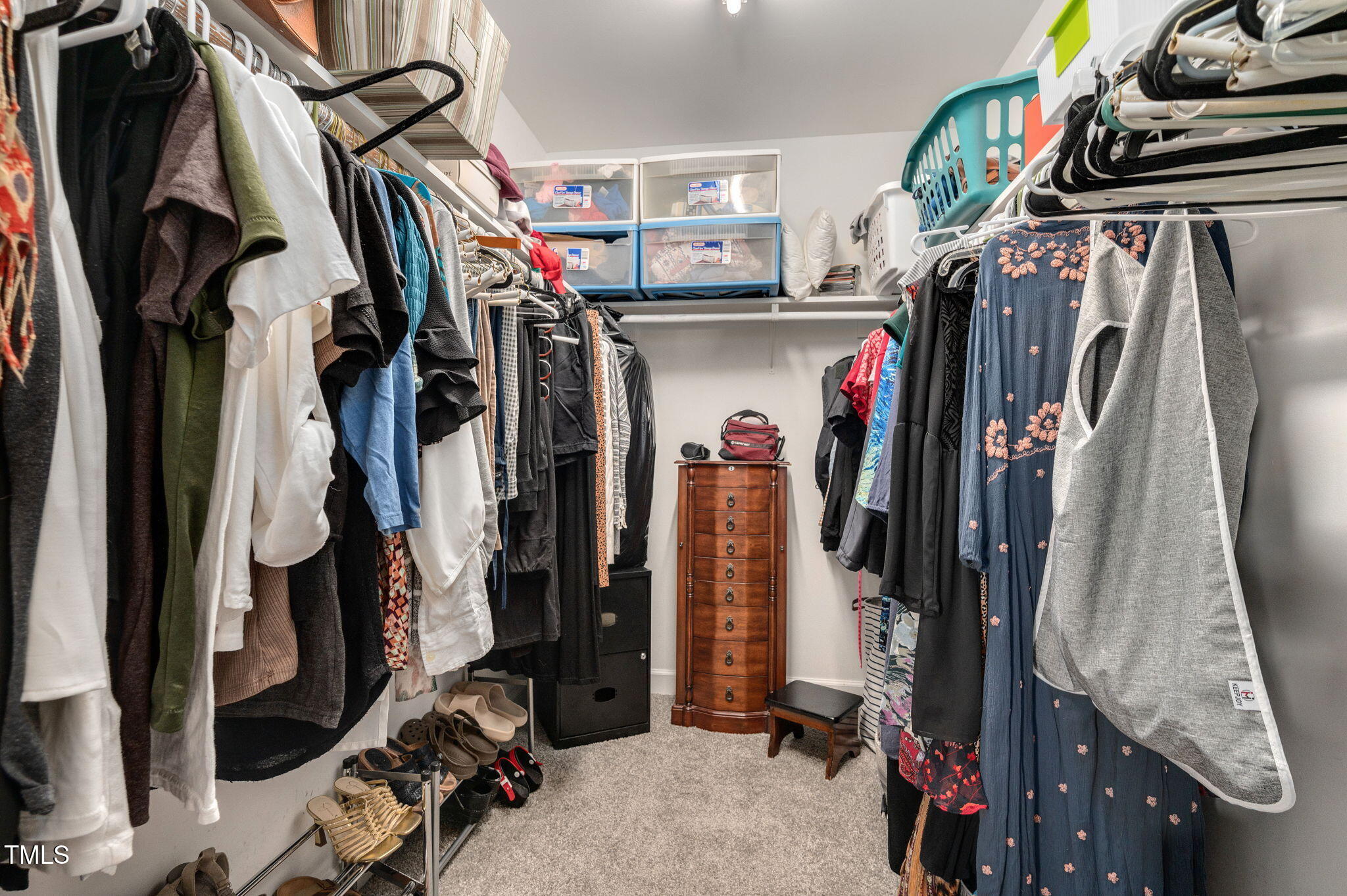 5320 Middleton Road Durham, NC 27713 - Photo 20 of 36 a view of walk in closet with clothes and shoes