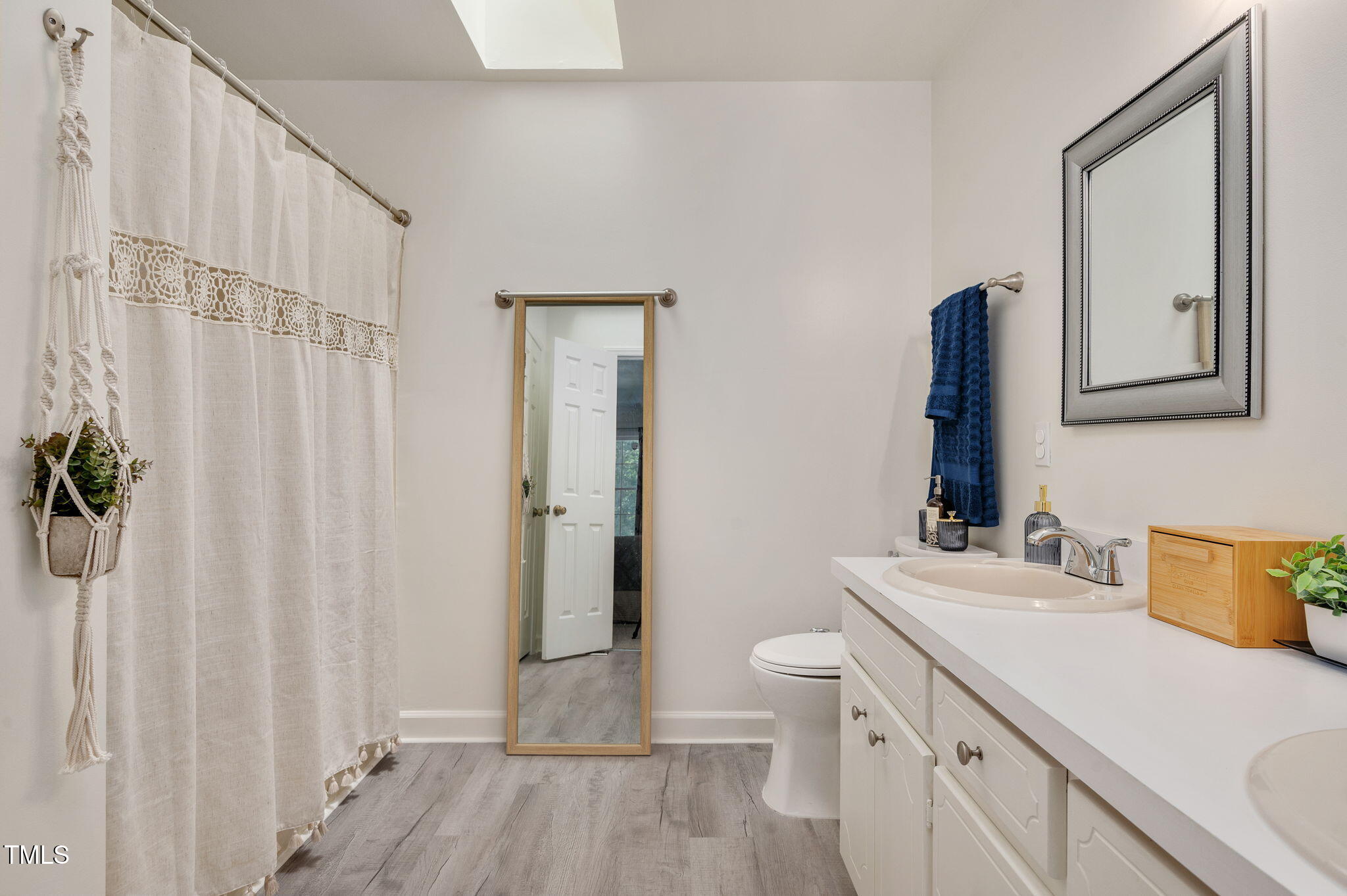 5320 Middleton Road Durham, NC 27713 - Photo 21 of 36 a bathroom with a sink toilet and shower